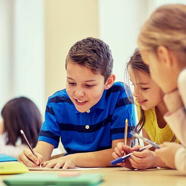 Group of school students collaborating on a project